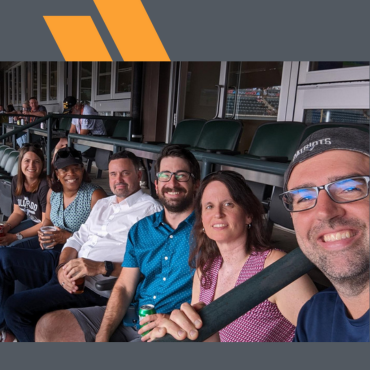 Some NEFE staff enjoying an afternoon Colorado Rockies baseball game