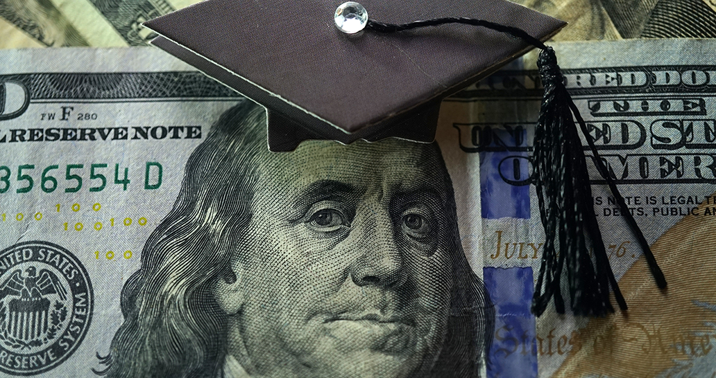 Image of Benjamin Franklin on American currency with graduation cap