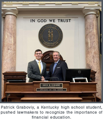 Patrick Graboviy shaking hands after the bill was passed.